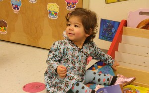 Coraline with books daycare day 1